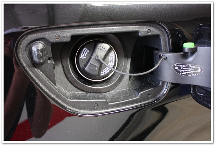 BMW M6 gas lid prior to detailing