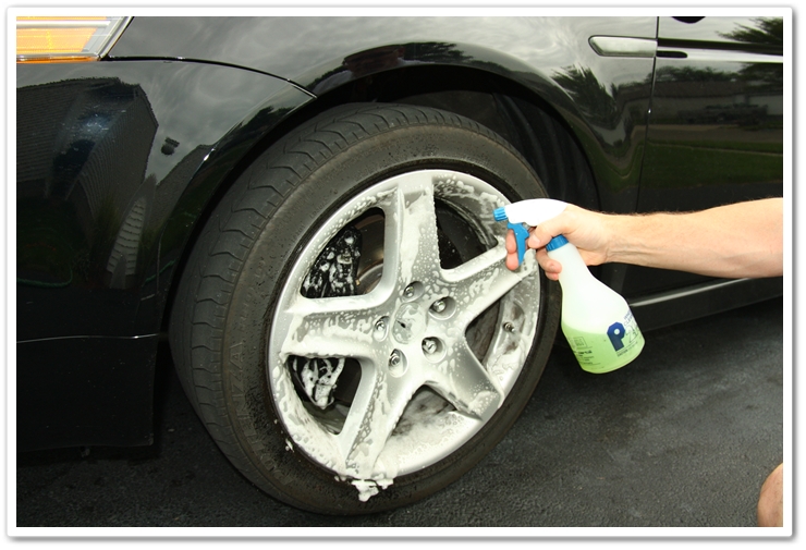 Spraying P21S Gel Wheel Cleaner onto the wheels of an 2007 Acura TL