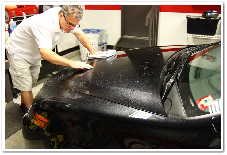 Claying the hood of a NBP 2007 Acura TL