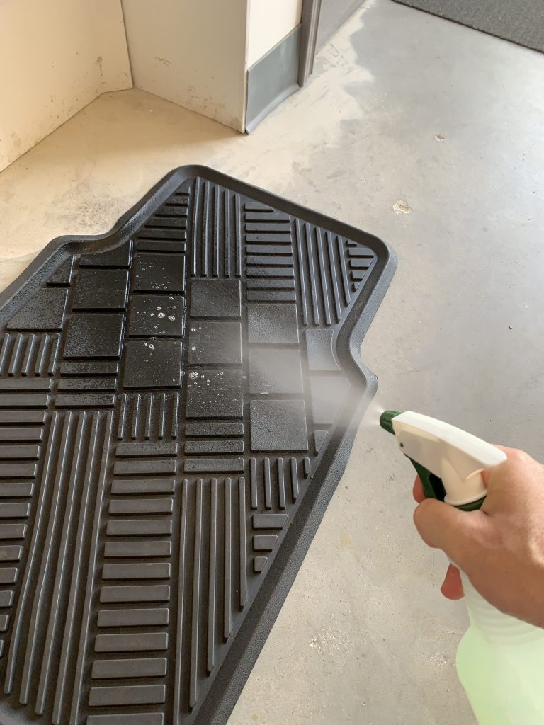 Blitz sprayed on dirty rubber floor mats