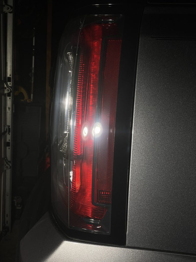 taillights of GMC Yukon after correction