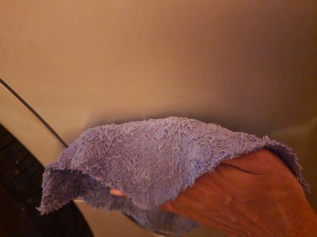 wiping with microfiber towel