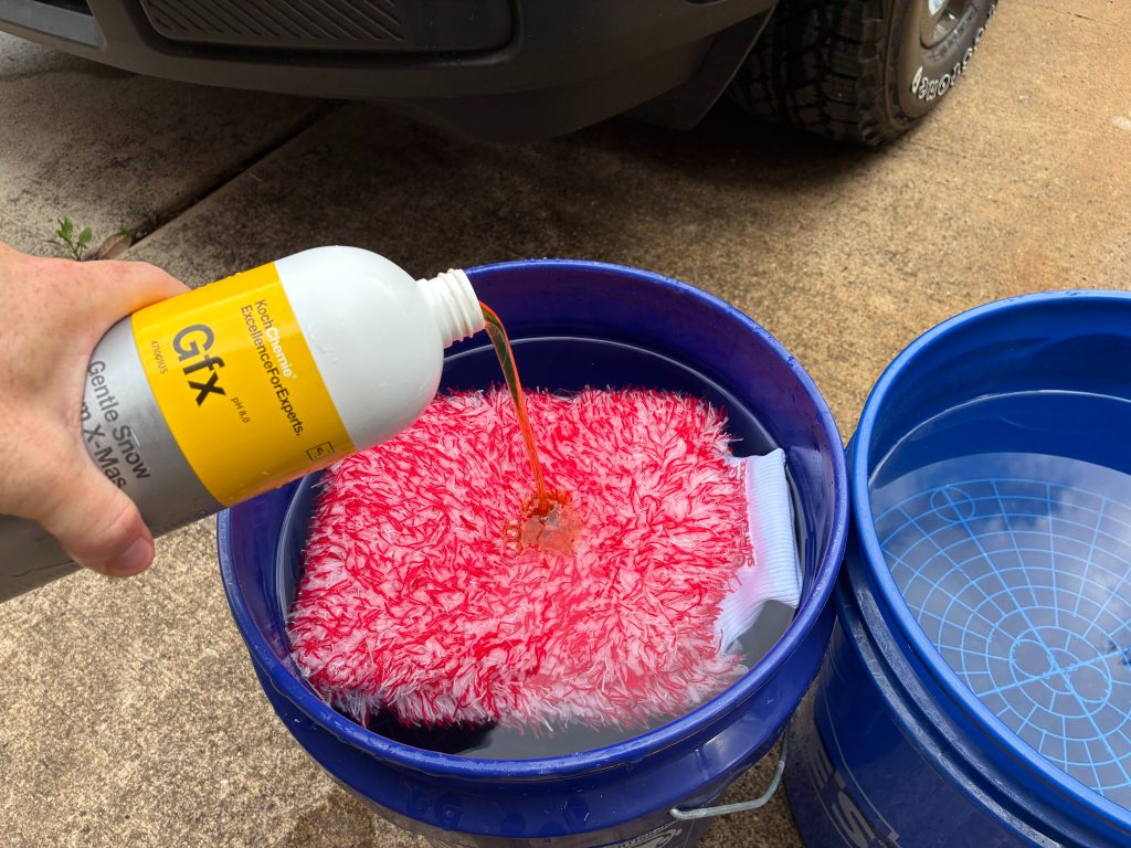 Pouring Shampoo into Wash Bucket