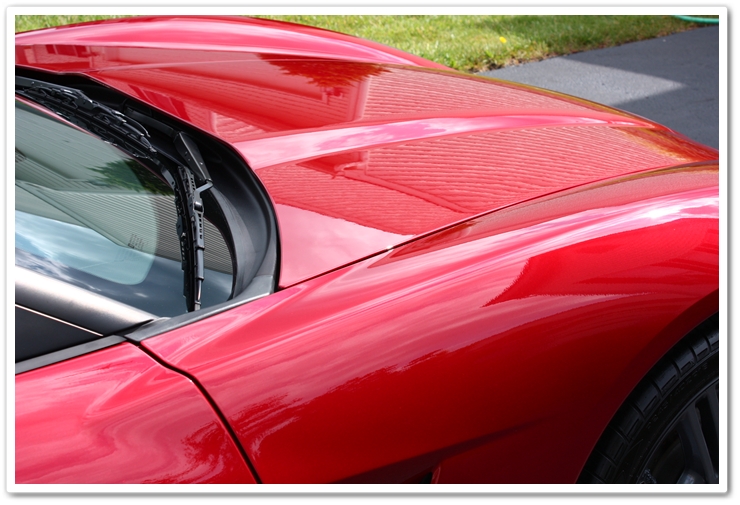 2008 Crystal Red Metallic Corvette topped with Blackfire Wet Diamond paint sealant