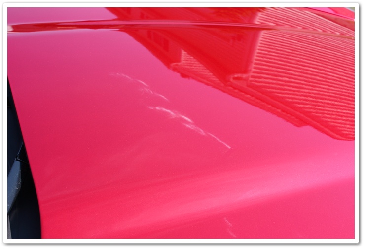 Hazing on a newly delivered 2008 Cyrstal Red Metallic Chevy Corvette prior to properly detailing