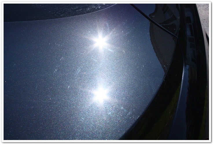 BMW M6 black sapphire metallic swirls before detailing