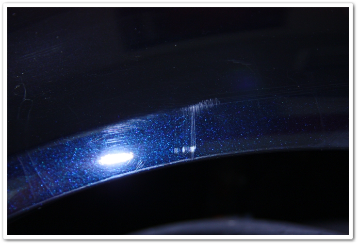 Imperfections on the front fender of an Acura TL in NBP prior to an Esoteric Auto Detail