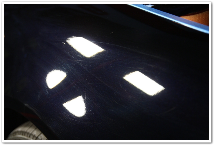 Fender of a 2007 Acura TL in NBP prior to polishing to correct the imperfections