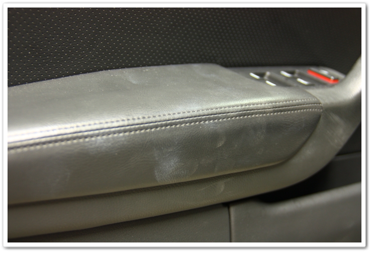 Arm rest of a 2006 Acura TL prior to detailing