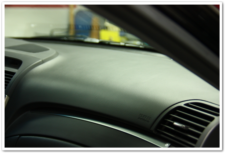Optimum Protectant Plus applied to the interior dash of an Acura TL