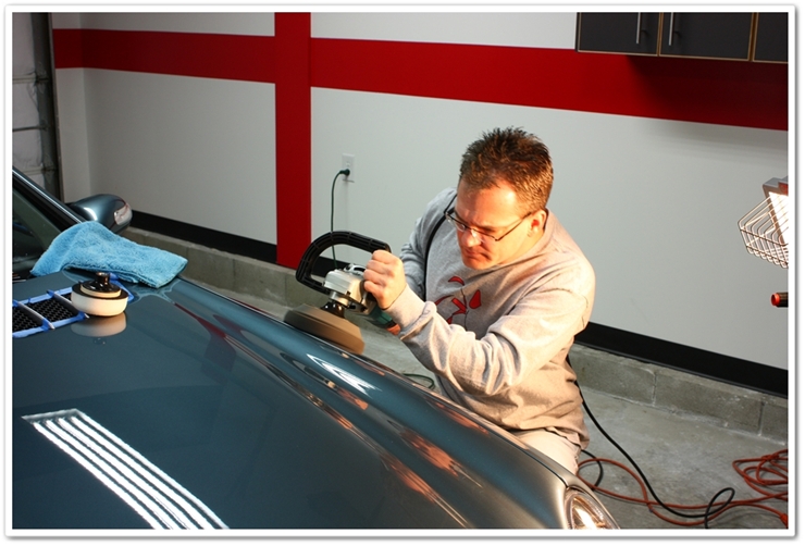 Todd Cooperider polishing a Mercedes SL500