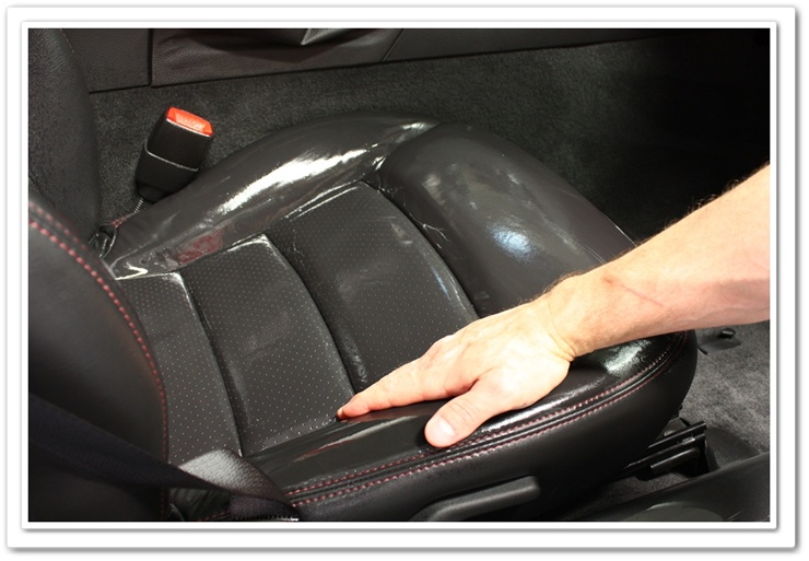 Working Leatherique into Chevy Corvette leather with bare hands