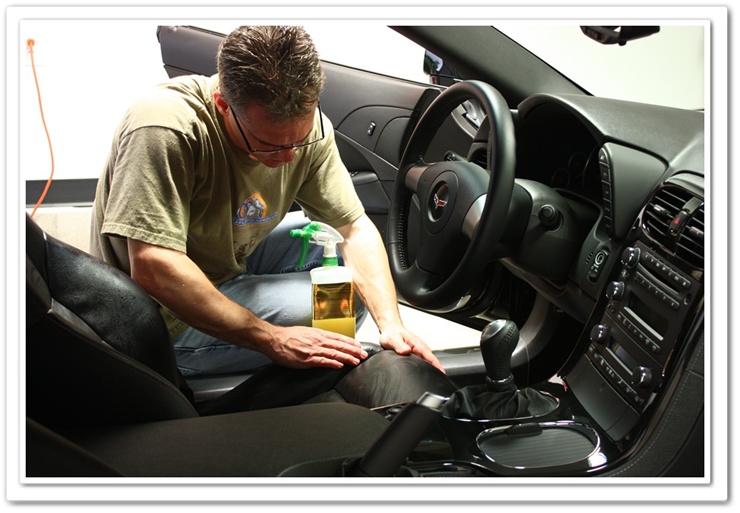 Working Leatherique into Chevy Corvette leather with bare hands