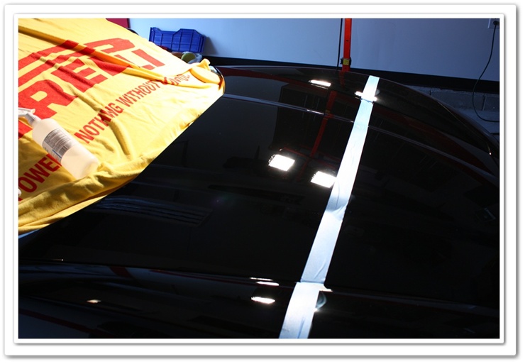 2008 black Chevy Z06 Corvette hood polished with Menzerna PO106FA Super Finish