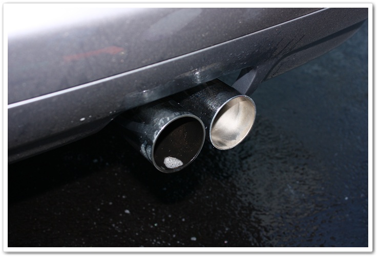 Before and after BMW M3 exhaust tips cleaneded with Chemical Guys Grime Reaper